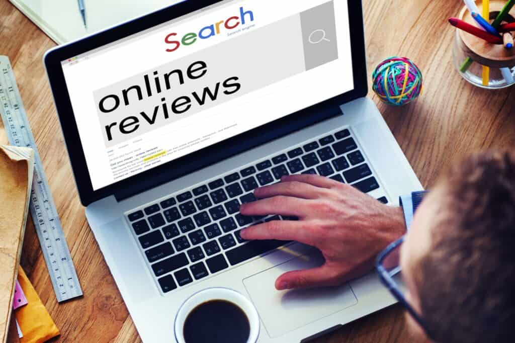 A man is searching for online reviews