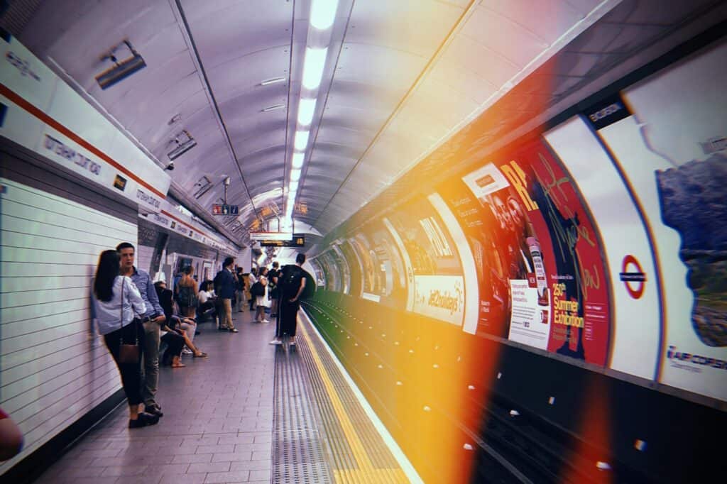 Passengers on a platform in an underground station