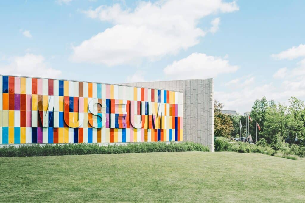 Outside a museum with a colourful wall