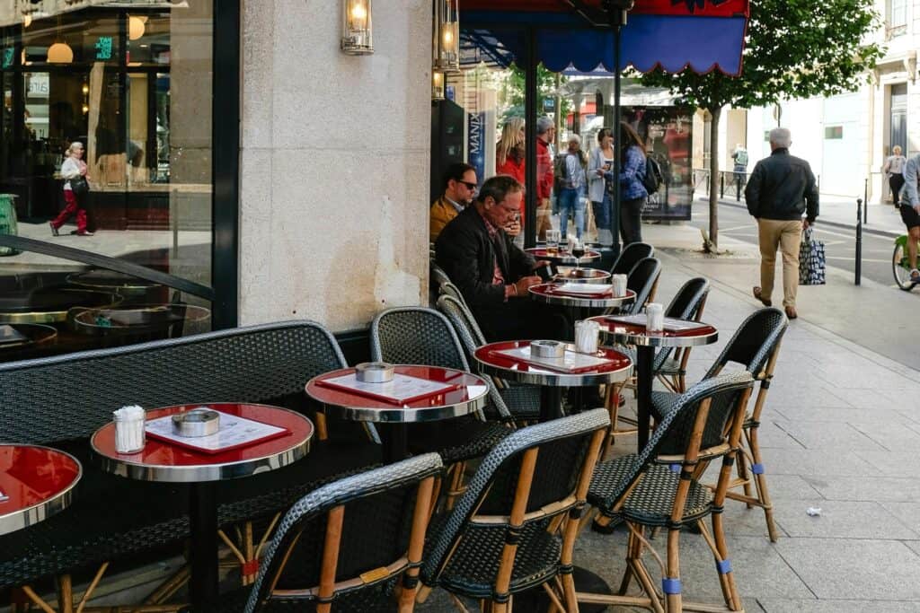 People outside a restaurant waiting for their food